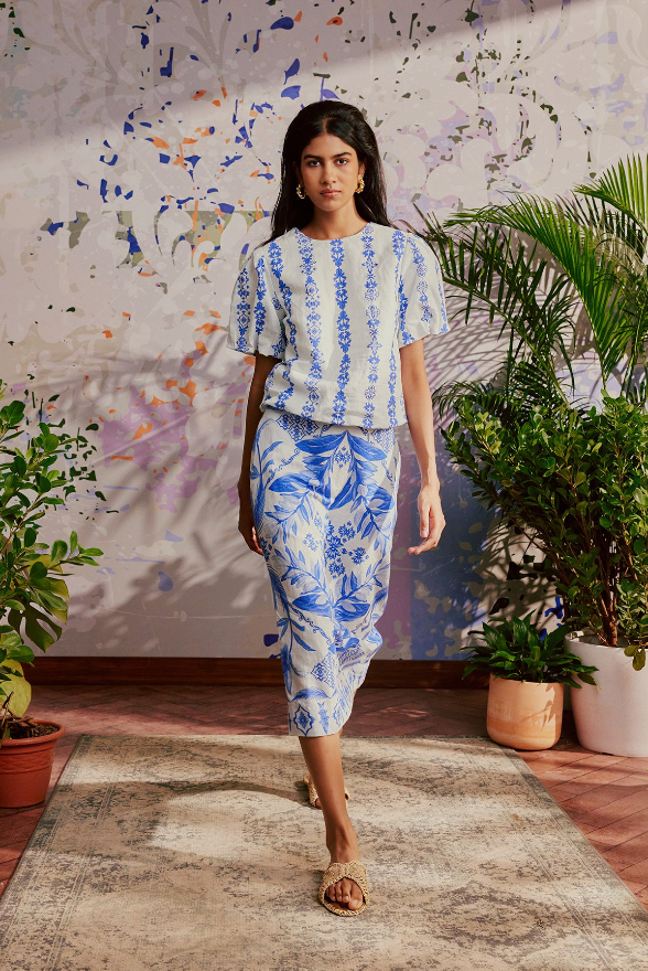 blue and white top and skirt set